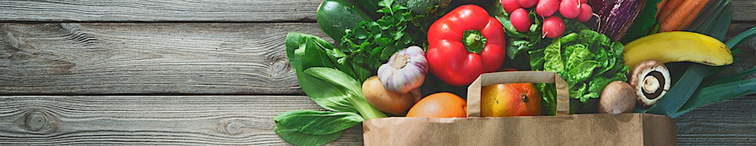 Healthy food selection. Shopping bag full of fresh vegetables and fruits. Flat lay food on table-profile-image